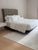 Tall Leather Grid Tufted Headboard, Elephant, Queen Bought in 2014, used for a queen bed, and now we rest it against our...
