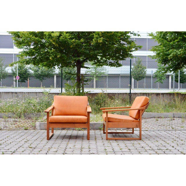 Mid Century German Vintage Lounge Chair in cognac leather. Beautiful patinated leather. Walnut wood. We have 2 chairs in...