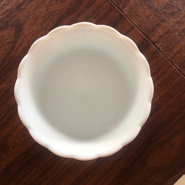 This vintage footed milk glass bowl is the perfect serving piece. Made by E.O.Brody Company, this rare find will add class...