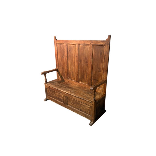 An impressive 19th-century fir wood chest, featuring a tall, imposing backrest that lends it a captivating presence. Solid...