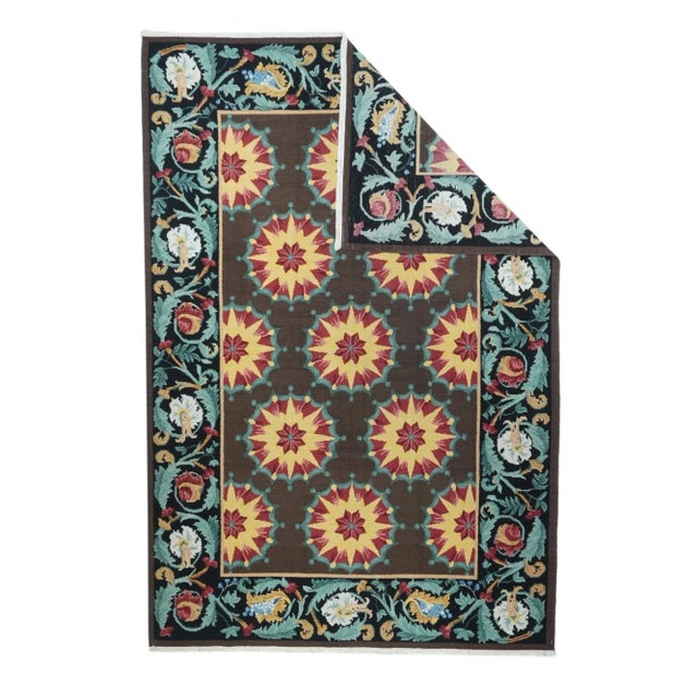 A technique rather than a specific type, in which warps are wrapped by colored wefts to create a pattern. Caucasian,...