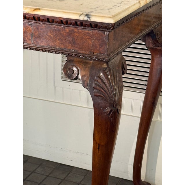 A wonderful Georgian Console . Elegant tall legs terminating in Cabriole Legs with Shell Motifs The prominent front legs...