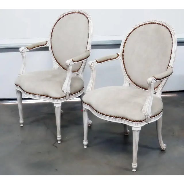 Pair Gustavian Cameo Back Swedish distressed painted armchairs. Measures: 19" seat height.