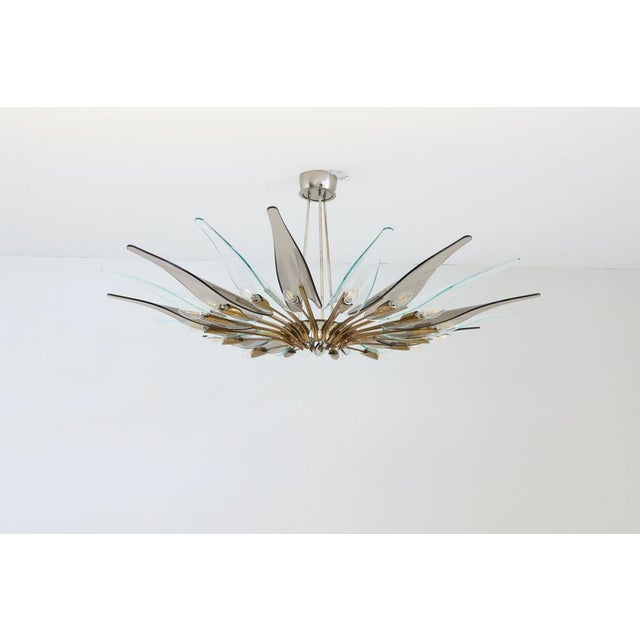 One of the most iconic pieces from the fontana arte archive, the "dahlia" chandelier, designed in the mid-1950s, continues...