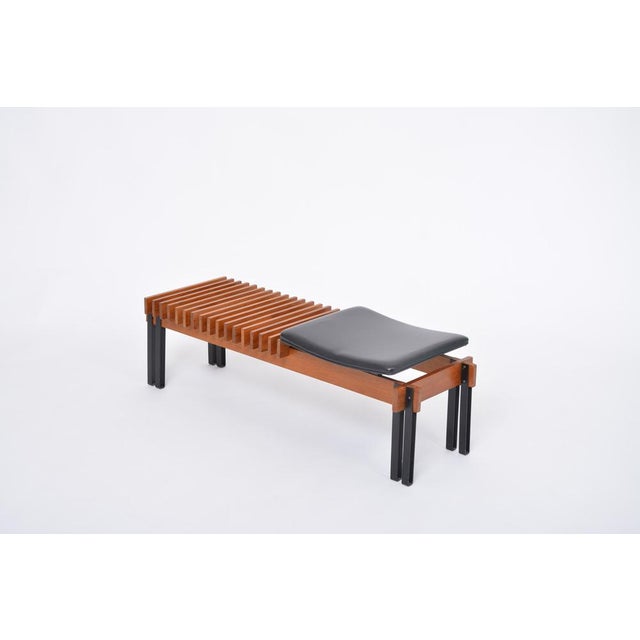 Mid-Century Modern slatted Teak bench by Inge and Luciano Rubino for Apec This bench is one of the few objects the Danish...