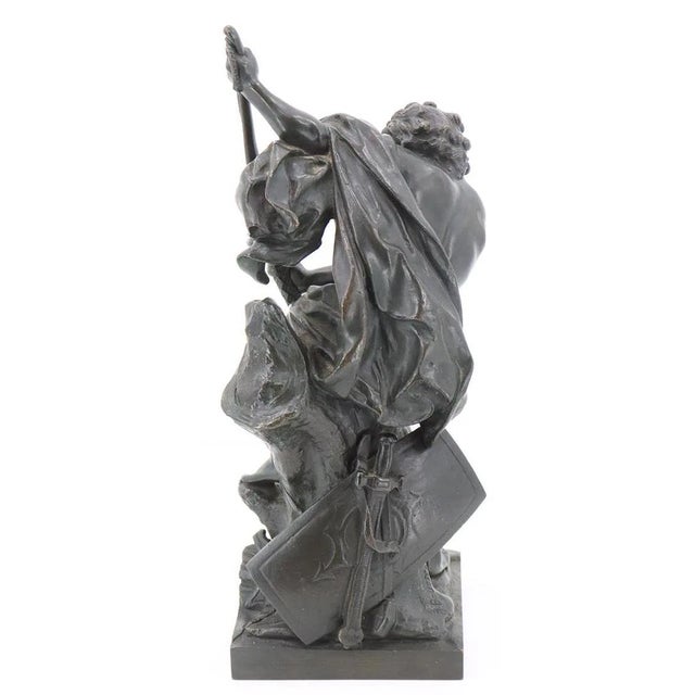 A powerful French bronze sculpture after Jacques Bousseau (1681–1740), depicting the legendary hero Ulysses Stringing the...