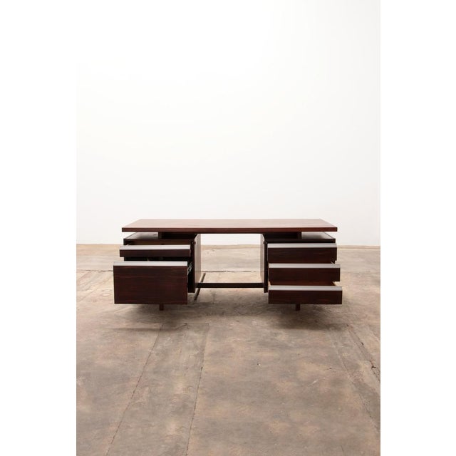 Rare executive desk model J1 designed by Kho Liang Ie for Fristho in 1956. Executive desk made of wood and finished with...