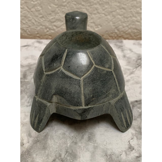 Vintage carved stone turtle tea light holder. Minimalistic and whimsical. Lots of textured detail all over. Holds a...