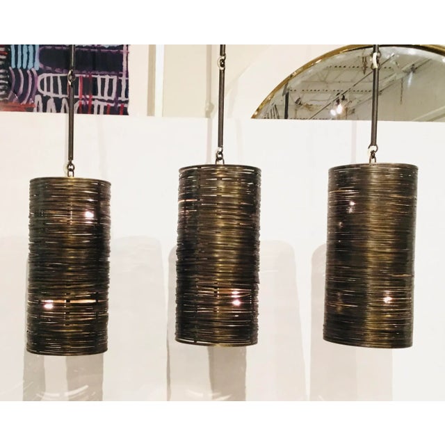 Original Retail $3750, stylish Global View Industrial Modern Bronze Finished Coil Three Pendant Light, showroom floor sample