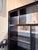 A striking Ethan Allen Curson display bookcase crafted in Indonesia from richly finished mahogany. The architectural open...