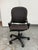 Design Plus Gallery presents an Office Armless Chair by Steelcase. Gray nylon upholstery covers the padded seat and back,...