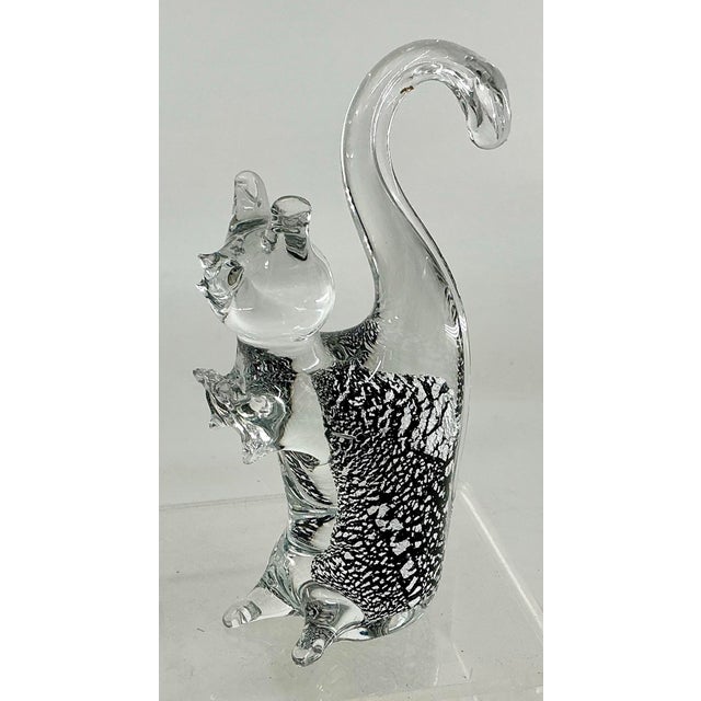 Cute Murano hand blown glass cat . Clear glass with black and silver specks detail inside