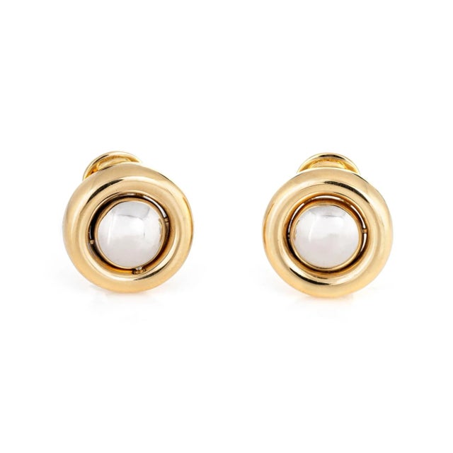 Elegant pair of estate Chopard movable diamond earrings crafted in 18k yellow gold. Diamonds are pave set into the centre...