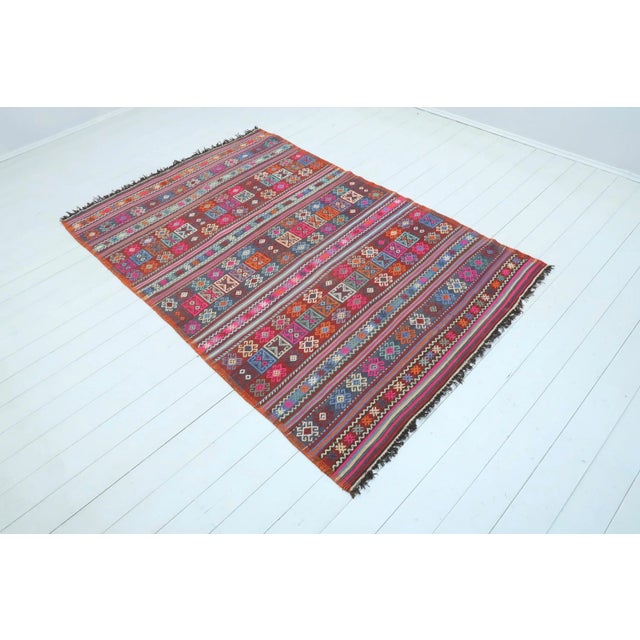 This beautiful vintage oriental embroidered and striped rug from westhern of turkey. Biga nomads kilim weaved with...