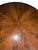 Exceptional late 19th century English pedestal dining table crafted in richly figured flame mahogany with an elegant...