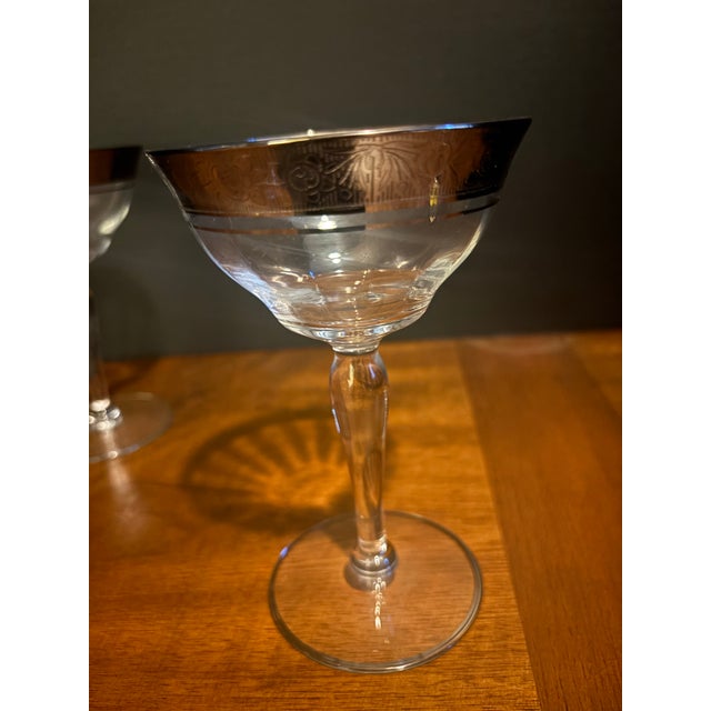 Elevate your bar cart with this stunning set of mid-century modern champagne coupe glasses, crafted by the renowned...