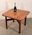 This solid oak game table is a well-executed example of Arts and Crafts furniture, with a quarter-sawn oak top, canted...