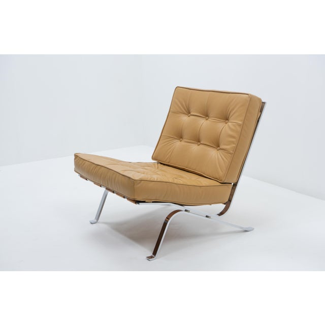 The RH-301 lounge chair was designed by Robert Haussmann as an attribute to the well-known Barcelona chair by Mies van der...