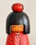 A signed Japanese sosaku (creative) kokeshi by Kazuo Takamizawa, executed in turned and hand-painted wood. This mid-...