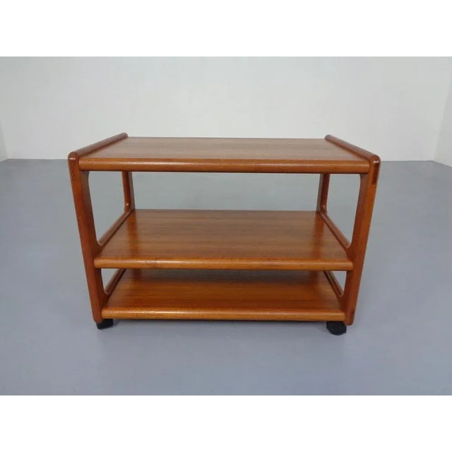 Rollable tea or serving cart in teak from the 1960s. Signed on the bottom.