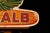 Mid 20th Century Vintage Nos DeKalb Winged Corn Advertising Sign For Sale - Image 5 of 7