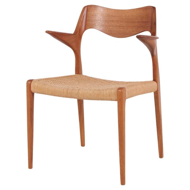 Model 55 dining chair by n.o. Møller for j.l. Møllers møbelfabrik in teak and woven seat from the 1960s. Danish design...