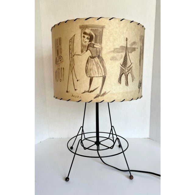 Here is a beautiful table lamp designed by Miss Anne Thrope for Archaic Smile in 1998. The shade is titled "Gay Paree" and...