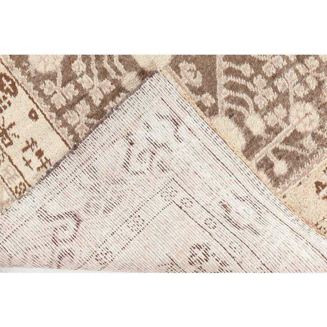 Midcentury Samarkand beige and brown handwoven wool rug Size: 5'9" × 11'3" (175 × 342 cm) The Midcentury Samarkand Beige...