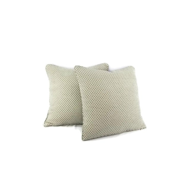 A misty aqua blue chenille on a white background in a mini geometric pattern pillow cover. This pillow is finished with...