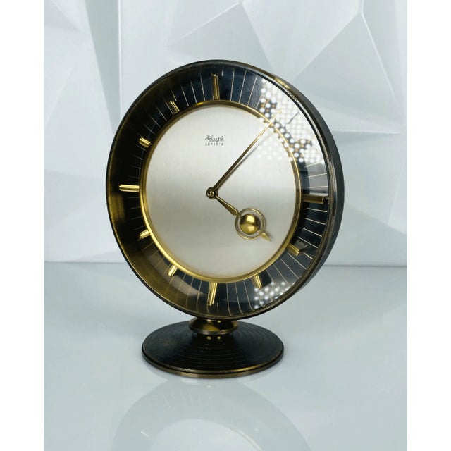 Superia Table Clock in Brass from Kienzle, 1950s, in Good conditions. Designed 1950 to 1959 This piece has an attribution...