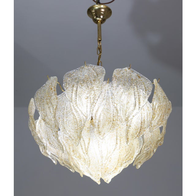Stunning Murano glass chandelier with dozens of gold transparent glass grit leaves. The chandelier measures 90 centimetres...