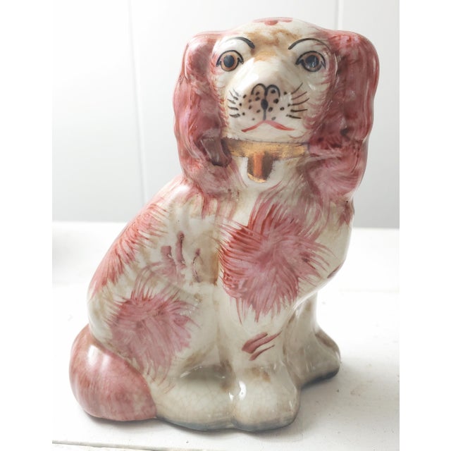 Here's a fine pair of reproduction Staffordshire Dogs from the late 20th Century. Faces have wonderful attitude. They...