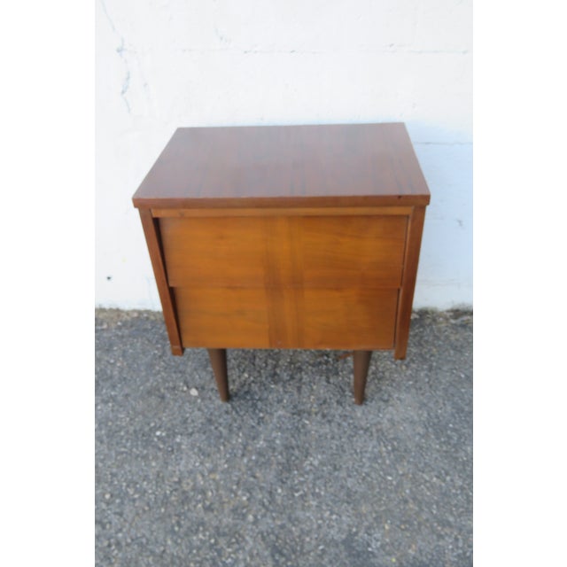 This beautiful Nightstand is made out of wood, walnut, and veneer. The Nightstand has Mid Century Modern style and design,...