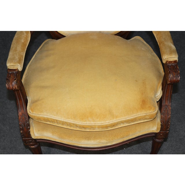 This elegant pair of French oval cameo-back armchairs captures the refined grace and sculptural delicacy associated with...