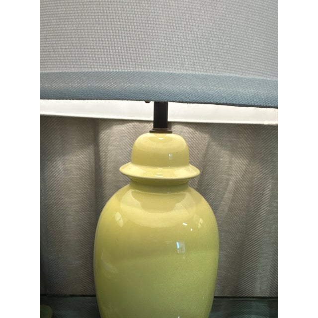 Vintage light yellow porcelain Chinoiserie jar table lamp. Cotton white lampshade is included. Lamp is 29.5”H to top of...
