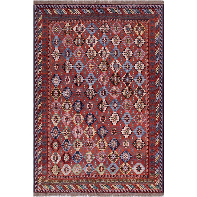 Experience the exceptional craftsmanship of this stunning Soumak rug, expertly created by skilled master weavers. Made...