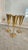 A handsome set of three vintage brass-plated metal goblets made in India, each distinguished by a tall tapered bowl,...