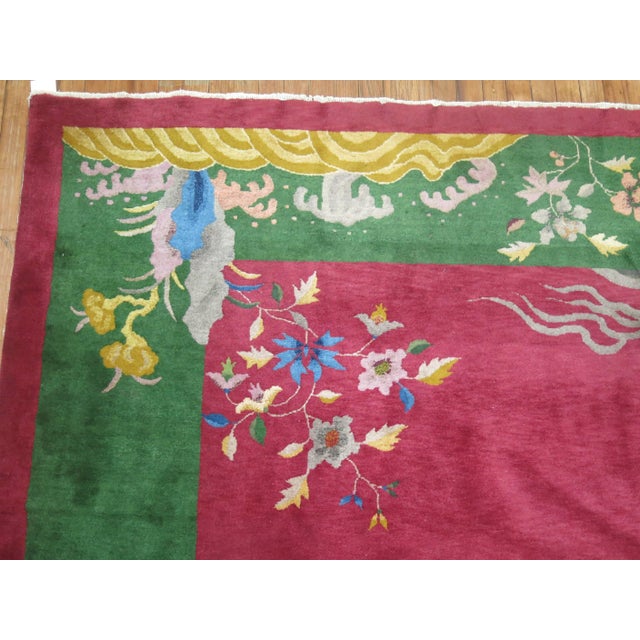 Stunning Chinese Art Deco rug with jewel tone colors. Rug features full pile in excellent condition with no repairs....