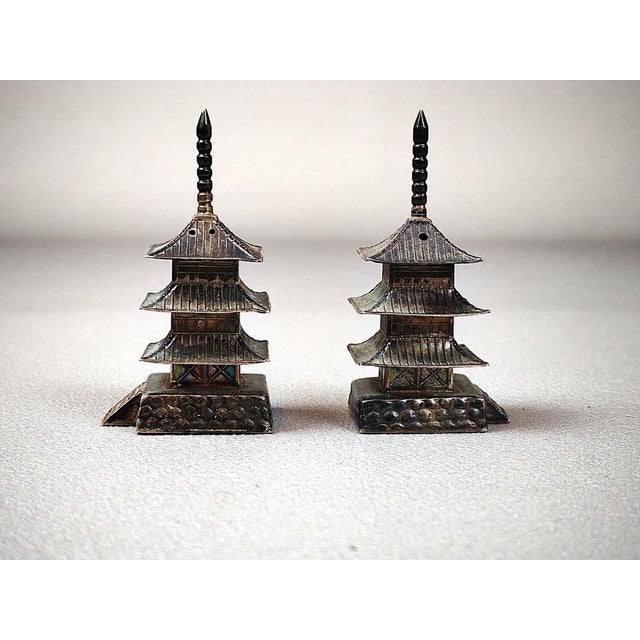 Antique Japanese spice containers in the form of a pagoda, characteristic of the multi-story tower of the Meiji...