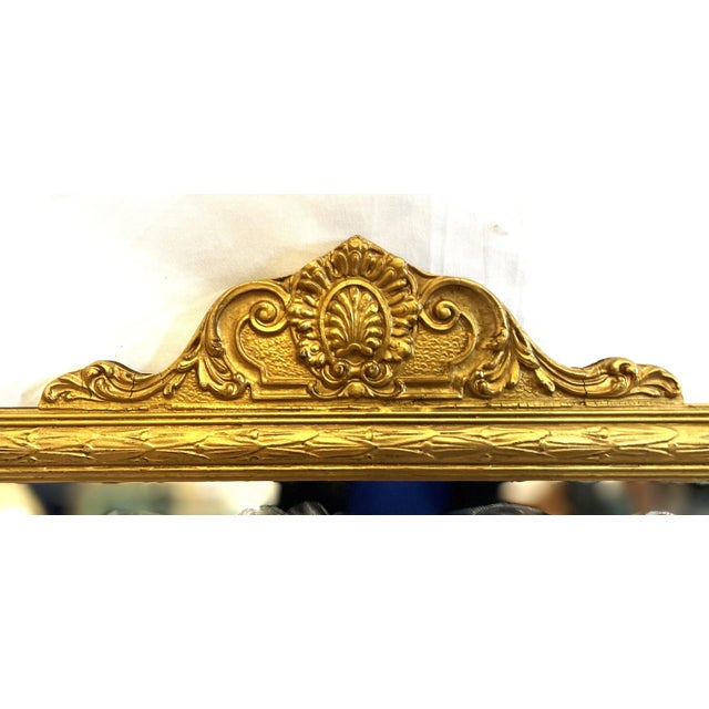 English Mid-1800s Ornately Carved Giltwood Empire Mirror For Sale - Image 3 of 7