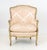 Louis XV Style Pink Silk Damask Upholstered Bergere, giltwood frame with cabriole legs. 35" H x 27.25" W x 30" D; seat:...