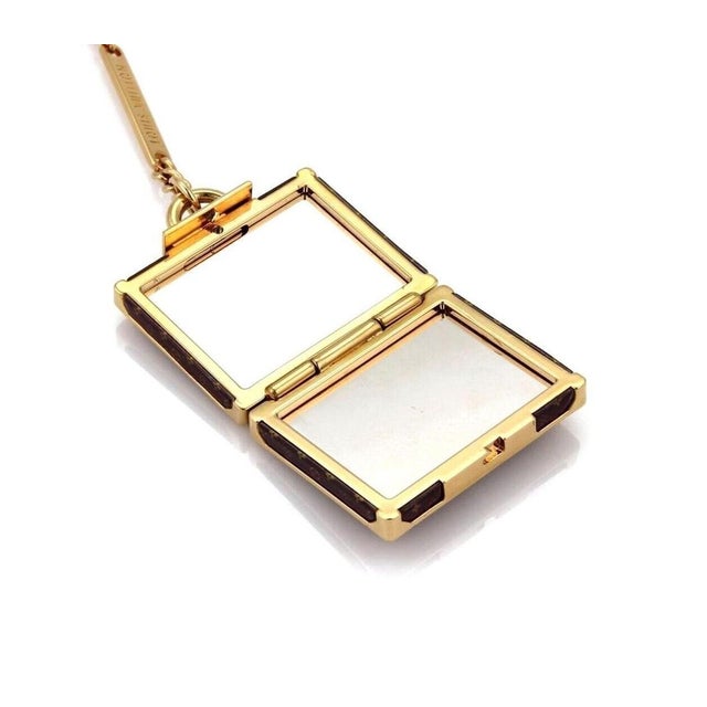 Crafted for the discerning Louis Vuitton aficionado, this Monogram Alzer bag charm serves as a chic accessory to...