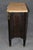 An elegant and distinctive Louis XVI-style commode by Theodore Alexander, combining classical French design with exotic...