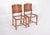 Pair of chairs, without seats. Slightly curved ergonomic backrests, in a single piece of moulded wood, with a diamond...