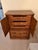 Vintage faux bamboo and cane armoire. Features a coastal or tropical "Hollywood Regency" aesthetic popular in the mid-...