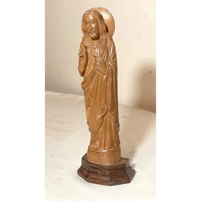 Up for sale is a wonderful vintage hand Carved religious Folk Art Jesus sculpture. It's carved with a lovely lifelike...