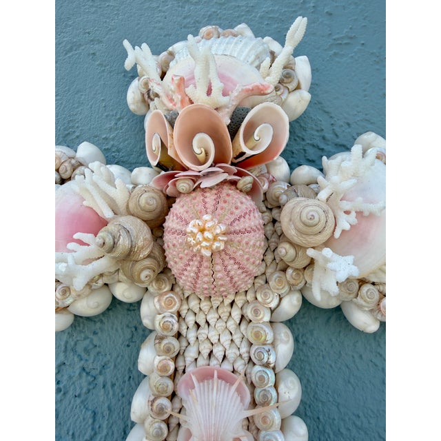 Christa's South Seashells 13"h. Cross in white and soft pink shells - including real pink pearl encrusted sea urchins. A...