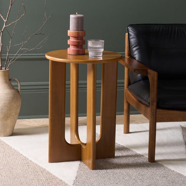 Introducing the Ashanka End Table in a warm Walnut hue. This beautifully crafted piece seamlessly complements any room...