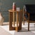 Introducing the Ashanka End Table in a warm Walnut hue. This beautifully crafted piece seamlessly complements any room...