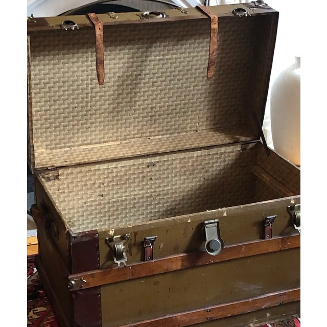 a large gorgeous antique steamer trunk, from the late 19th/20th century, walnut stained ,wooden structural banding, metal...